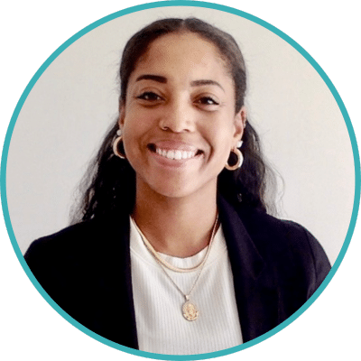 Headshot of Dr. Randi Jackson, a Black woman psychologist wearing a dark blazer, white shirt, and gold jewelry.